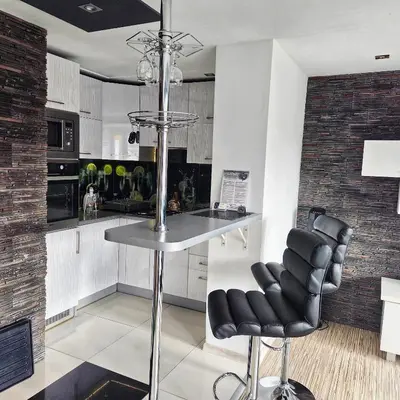 Kuchnia lub aneks kuchenny w obiekcie Black & White Komfortowe Apartamenty 2 km od Centrum