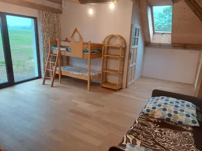 Łóżko lub łóżka w pokoju w obiekcie Agroturystyka BRYGADZIAKI
