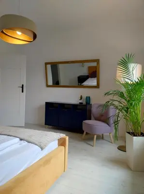 Łóżko lub łóżka w pokoju w obiekcie Tabago Studio 1 Opole, Kośnego