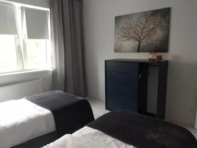 Łóżko lub łóżka w pokoju w obiekcie Tabago Studio 1 Opole, Kośnego
