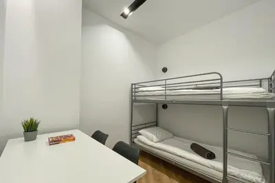 Łóżko lub łóżka w pokoju w obiekcie Hill Valley