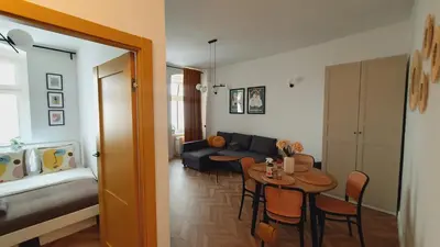 Łóżko lub łóżka w pokoju w obiekcie Kurkowa Apartment