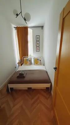 Łóżko lub łóżka w pokoju w obiekcie Kurkowa Apartment