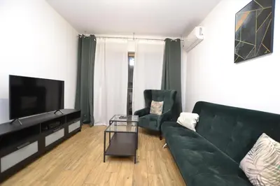 Telewizja i/lub zestaw kina domowego w obiekcie Apartament SZMARAGDOWY z garażem Centrum Gliwic-Klimatyzacja