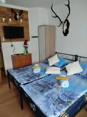 Łóżko lub łóżka w pokoju w obiekcie Seba