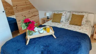 Łóżko lub łóżka w pokoju w obiekcie Słoneczna Chata z Bali