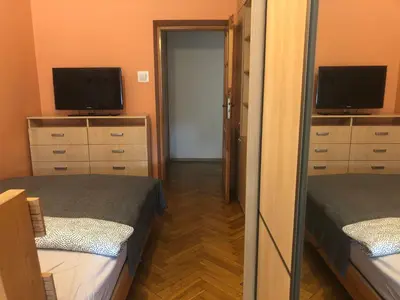 Łóżko lub łóżka w pokoju w obiekcie Blue River - Plac Legionow