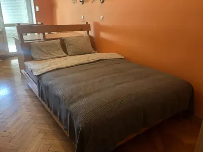 Łóżko lub łóżka w pokoju w obiekcie Blue River - Plac Legionow