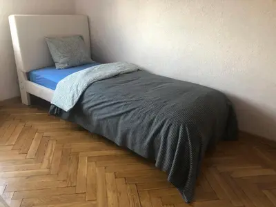 Łóżko lub łóżka w pokoju w obiekcie Blue River - Plac Legionow