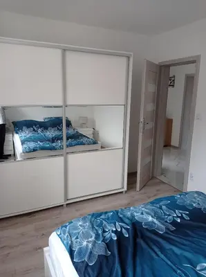 Łóżko lub łóżka w pokoju w obiekcie Sielankowy Domek
