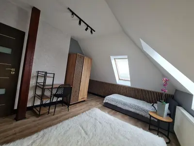 Łóżko lub łóżka w pokoju w obiekcie Słoneczna Willa SUDETY - Dom na wyłączność