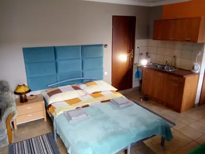 Łóżko lub łóżka w pokoju w obiekcie ANIA