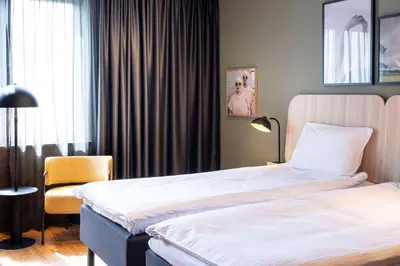 Łóżko lub łóżka w pokoju w obiekcie Scandic Wrocław