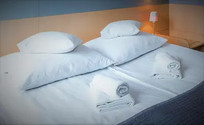 Łóżko lub łóżka w pokoju w obiekcie Weiser Hotel