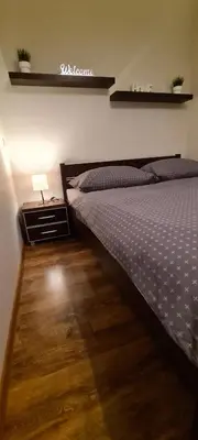 Łóżko lub łóżka w pokoju w obiekcie Apartament Home NETFLIX