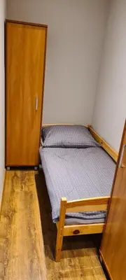 Łóżko lub łóżka w pokoju w obiekcie Apartament Home NETFLIX