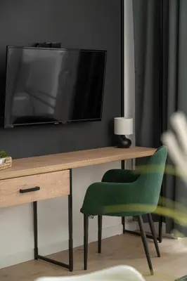 Telewizja i/lub zestaw kina domowego w obiekcie Airport Studio Zarembowicza by Noclegi Renters