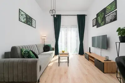 Telewizja i/lub zestaw kina domowego w obiekcie Exclusive Apartment Kajdasza Wroclaw by Noclegi Renters