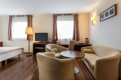 Telewizja i/lub zestaw kina domowego w obiekcie Qubus Hotel Gliwice
