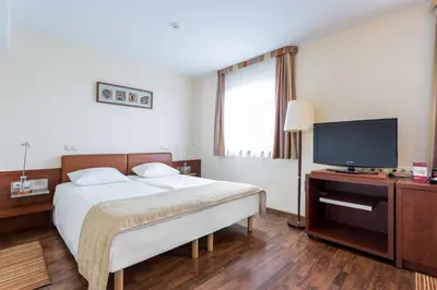 Telewizja i/lub zestaw kina domowego w obiekcie Qubus Hotel Gliwice