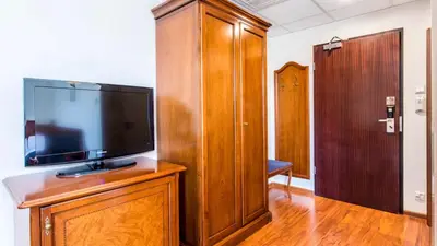 Telewizja i/lub zestaw kina domowego w obiekcie Qubus Hotel Wrocław