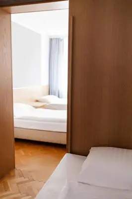 Łóżko lub łóżka w pokoju w obiekcie Geovita Lądek Zdrój