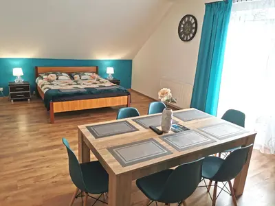 Łóżko lub łóżka w pokoju w obiekcie Noclegi przy Wiadukcie - Apartamenty