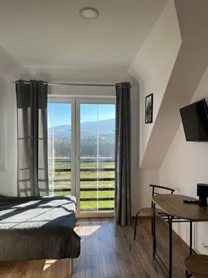 Telewizja i/lub zestaw kina domowego w obiekcie Agroturystyka Liana