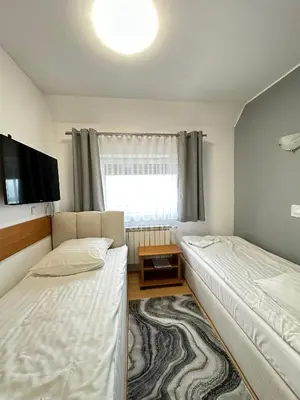 Łóżko lub łóżka w pokoju w obiekcie Motel Za Miedzą