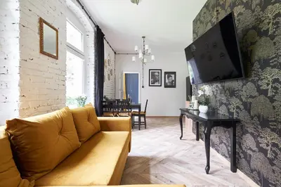 Telewizja i/lub zestaw kina domowego w obiekcie Art Apartment Grzmiąca