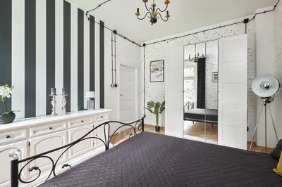 Łóżko lub łóżka w pokoju w obiekcie Art Apartment Grzmiąca