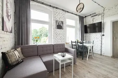 Część wypoczynkowa w obiekcie Loft Apartment Grzmiąca