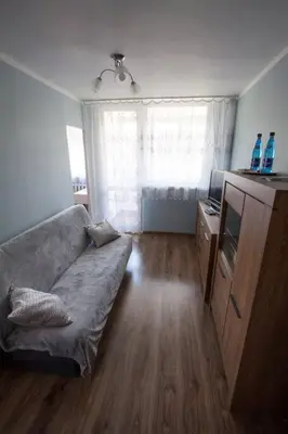 Łóżko lub łóżka w pokoju w obiekcie Mieszkanie w sercu Sudetów