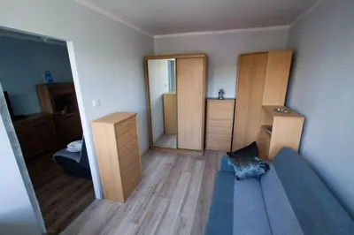Łóżko lub łóżka w pokoju w obiekcie Mieszkanie w sercu Sudetów
