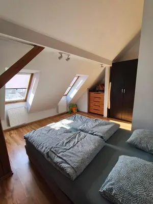 Łóżko lub łóżka w pokoju w obiekcie Apartament Gliwice Centrum