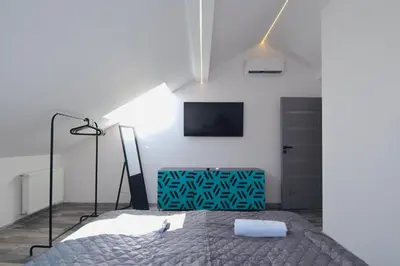 Łóżko lub łóżka w pokoju w obiekcie Apartamenty Żołnierska 31 - Apartament nr 1