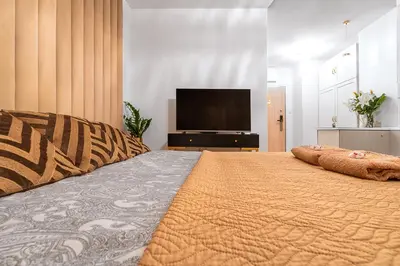 Telewizja i/lub zestaw kina domowego w obiekcie Apartament Versace Księcia Witolda
