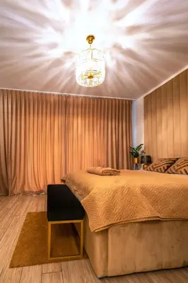 Łóżko lub łóżka w pokoju w obiekcie Apartament Versace Księcia Witolda