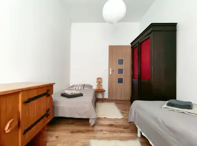 Łóżko lub łóżka w pokoju w obiekcie Apartament Alpejski Duży