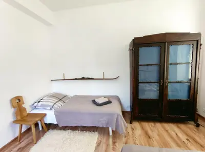 Łóżko lub łóżka w pokoju w obiekcie Apartament Alpejski Duży