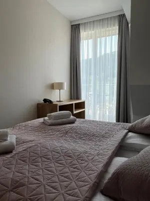 Łóżko lub łóżka w pokoju w obiekcie Aparthotel Apartamenty Czarna Góra 417