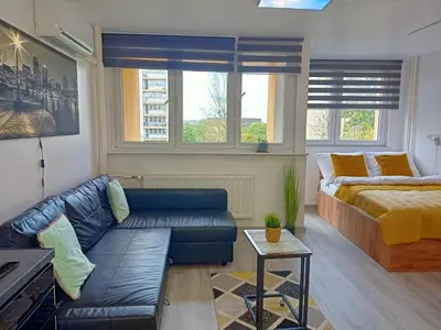 Łóżko lub łóżka w pokoju w obiekcie Apartament z balkonem Gliwice Mewy
