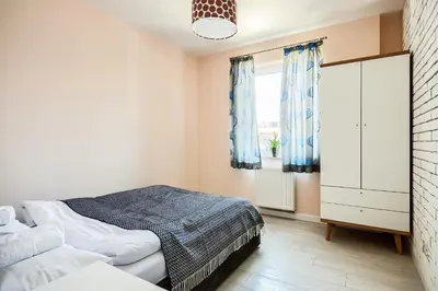 Łóżko lub łóżka w pokoju w obiekcie Jutrzenka