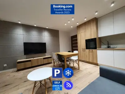 Telewizja i/lub zestaw kina domowego w obiekcie Tesorio Apartment Wroclaw Modern Stay