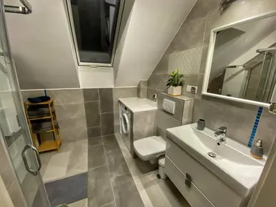 Łazienka w obiekcie Apartamenty Eksploris II
