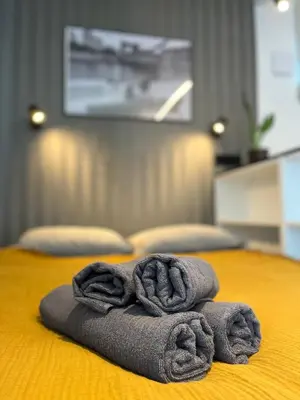Łóżko lub łóżka w pokoju w obiekcie Halo Apartments Check in 24h Privat Parking