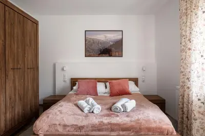 Łóżko lub łóżka w pokoju w obiekcie Apartament CALLUNA