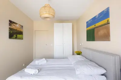 Łóżko lub łóżka w pokoju w obiekcie Apartament Widokowy - Penthouse z tarasem