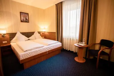 Łóżko lub łóżka w pokoju w obiekcie Business Hotel Vega Wrocław