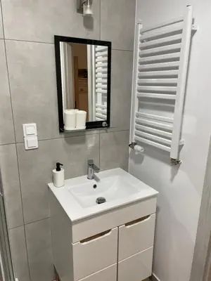 Łazienka w obiekcie Uroczy apartament w kurorcie